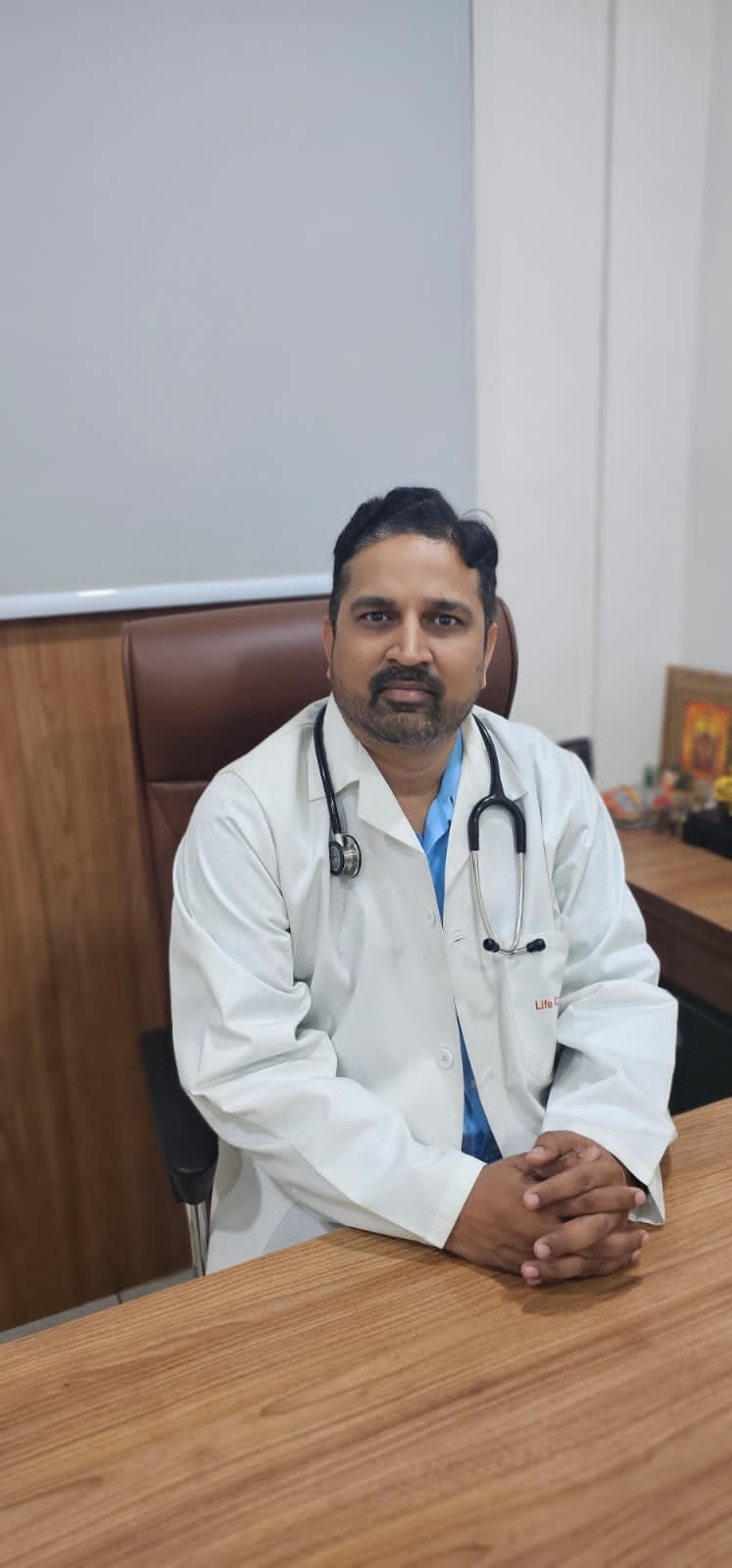 Dr. Limesh Vyas